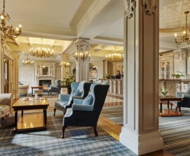 Foyer of Killarney Avenue Hotel with seating area and fireplace